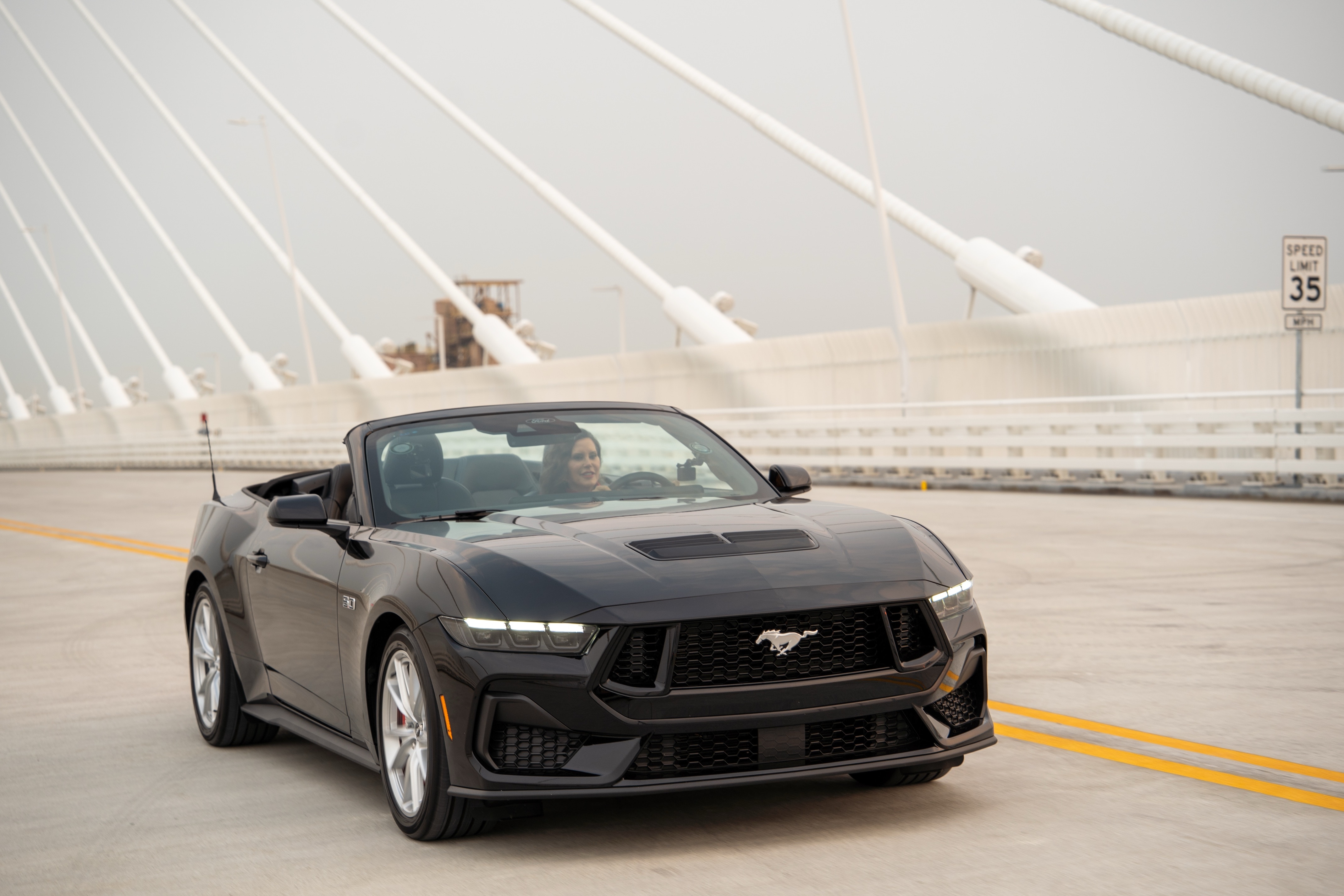 Michigan Gov. Gretchen Whitmer drive across the new Gordie Howe Bridge in a Ford Mustang on July 27., 2026.